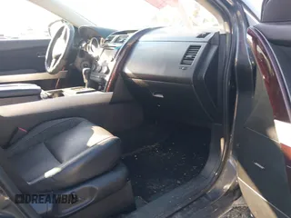2013 Mazda CX-9 Grand Touring z VIN JM3TB2DA6D0424124, wystawiony jako IAAI lot #42032588 z przebiegiem 151 569 mil mil oraz . Historia ofert i sprzedaży dostępna na DreamBid. Obrazek 5.