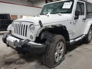 2014 Jeep Wrangler Sahara with VIN 1C4AJWBG7EL234625, listed as a IAAI auction lot 41726770 with 128,080 mi miles and . Bid and sale history available at DreamBid. Image 6.