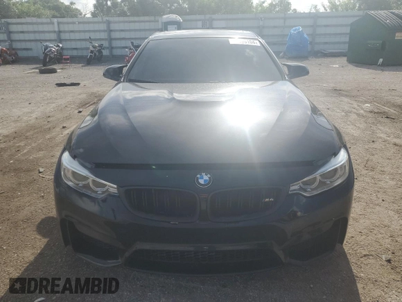 2015 BMW M4 with VIN WBS3R9C57FK332862, listed as a Copart auction lot 59395104 with 63,112 mi miles and Salvage Title. Bid and sale history available at carsss.com. Image 5.