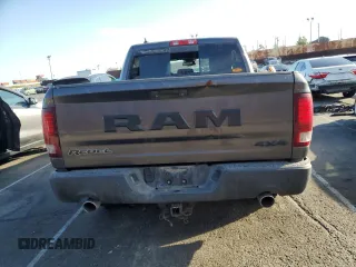 2016 Ram 1500 Rebel z VIN 1C6RR7YT6GS211830, wystawiony jako Copart lot #54072485 z przebiegiem 56 512 mil mil oraz Szkody całkowita. Historia ofert i sprzedaży dostępna na DreamBid. Obrazek 6.
