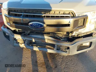 2019 Ford F-150 XL with VIN 1FTEW1CP5KKC67435, listed as a IAAI auction lot 41143282 with 134,419 mi miles and . Bid and sale history available at DreamBid. Image 6.