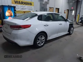 2018 Kia Optima S with VIN 5XXGT4L35JG209737, listed as a IAAI auction lot 41806505 with 98,869 mi miles and . Bid and sale history available at DreamBid. Image 4.