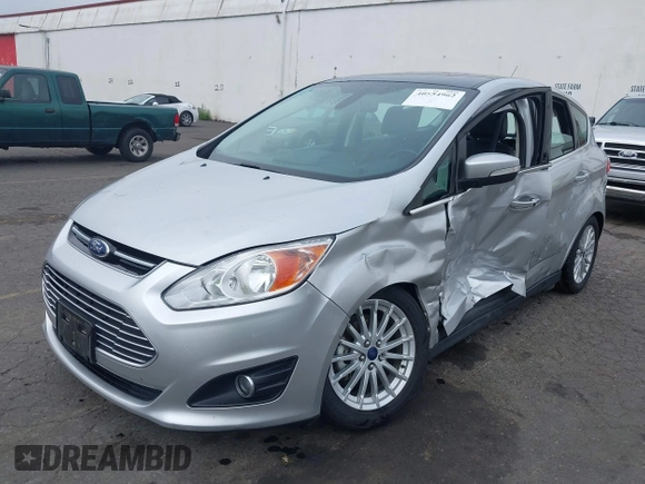 2014 Ford C-Max SEL z VIN 1FADP5BU7EL511677, wystawiony jako IAAI lot #40554962 z przebiegiem 63 031 mil mil oraz . Historia ofert i sprzedaży dostępna na DreamBid. Obrazek 2.