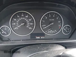 2015 BMW 3 Series 328i xDrive with VIN WBA3B5G59FNS19005, listed as a IAAI auction lot 41570070 with 104,666 mi miles. Bid and sale history available at carsss.com. Image 7.