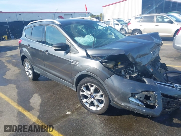 2015 Ford Escape Titanium with VIN 1FMCU0JX1FUB92412, listed as a IAAI auction lot 41893933 with 95,306 mi miles. Bid and sale history available at carsss.com. Image 1.