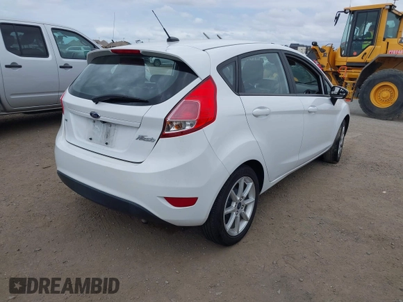 2019 Ford Fiesta SE with VIN 3FADP4EJXKM143274, listed as a IAAI auction lot 42124127 with 85,525 mi miles. Bid and sale history available at carsss.com. Image 4.