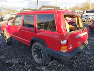 1997 Jeep Cherokee Sport with VIN 1J4FJ68S9VL569350, listed as a IAAI auction lot 41033623 with 299,012 mi miles. Bid and sale history available at carsss.com. Image 3.
