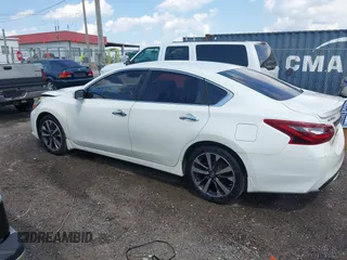 2017 Nissan Altima SV with VIN 1N4AL3AP0HC130420, listed as a IAAI auction lot 42004521 with 144,378 mi miles and . Bid and sale history available at DreamBid. Image 14.