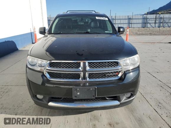 2013 Dodge Durango Crew z VIN 1C4RDJDG7DC584541, wystawiony jako Copart lot #55957665 z przebiegiem 142 639 mil mil oraz Czysty tytuł • Clean title. Historia ofert i sprzedaży dostępna na DreamBid. Obrazek 5.