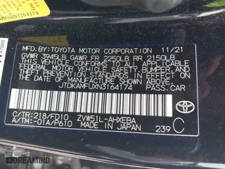 2022 Toyota Prius L Eco with VIN JTDKAMFUXN3164174, listed as a IAAI auction lot 41512388 with 33,664 mi miles. Bid and sale history available at carsss.com. Image 9.