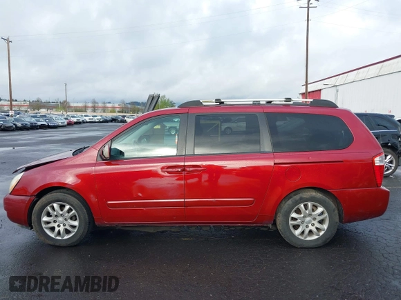 2006 Kia Sedona LX with VIN KNDMB233X66030979, listed as a IAAI auction lot 41933430 with 127,305 mi miles and . Bid and sale history available at DreamBid. Image 14.