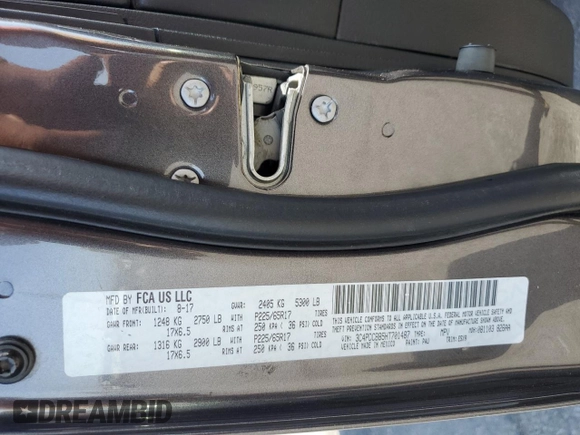 2017 Dodge Journey SXT with VIN 3C4PDCBB5HT701487, listed as a Copart auction lot 58821045 with 118,585 mi miles and Salvage title. Bid and sale history available at DreamBid. Image 13.