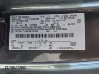 2019 Ford F-150 XL z VIN 1FTEX1C51KFA73506, wystawiony jako IAAI lot #42065274 z przebiegiem 144 397 mil mil oraz . Historia ofert i sprzedaży dostępna na DreamBid. Obrazek 9.