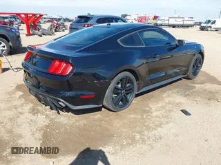 2015 Ford Mustang EcoBoost z VIN 1FA6P8TH9F5355840, wystawiony jako IAAI lot #42552910 z przebiegiem 96 422 mil mil oraz . Historia ofert i sprzedaży dostępna na DreamBid. Obrazek 4.
