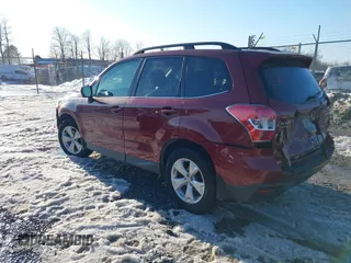 2014 Subaru Forester 2.5i Limited with VIN JF2SJAHC6EH441412, listed as a IAAI auction lot 41376172 with 137,378 mi miles. Bid and sale history available at carsss.com. Image 3.
