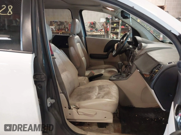 2004 Saturn VUE V6 with VIN 5GZCZ534X4S810971, listed as a IAAI auction lot 41644628 with 206,405 mi miles. Bid and sale history available at carsss.com. Image 5.