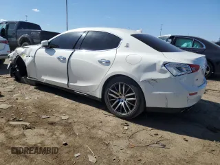2014 Maserati Ghibli S Q4 z VIN ZAM57RTA2E1083387, wystawiony jako Copart lot #53621465 z przebiegiem Nie podano mil oraz Szkody całkowita. Historia ofert i sprzedaży dostępna na DreamBid. Obrazek 2.