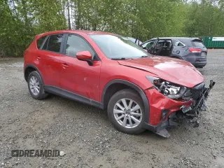 2015 Mazda CX-5 Touring with VIN JM3KE4CY2F0532871, listed as a Copart auction lot 55244375 with Not Provided miles and Salvage Title. Bid and sale history available at carsss.com. Image 4.