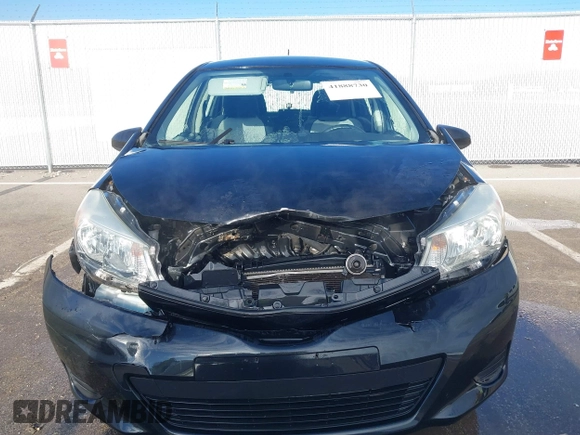 2014 Toyota Yaris L with VIN JTDKTUD36ED586456, listed as a IAAI auction lot 41888730 with 92,742 mi miles. Bid and sale history available at carsss.com. Image 6.