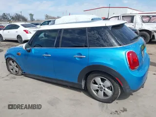 2017 MINI Hardtop 4 Door Cooper with VIN WMWXU1C53H2E17614, listed as a IAAI auction lot 41686204 with 53,409 mi miles and . Bid and sale history available at DreamBid. Image 15.