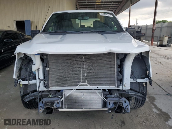2023 Ford F-150 XL with VIN 1FTEW1CP9PKD19429, listed as a Copart auction lot 58021125 with 13,678 mi miles and Salvage title. Bid and sale history available at DreamBid. Image 5.