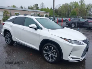 2021 Lexus RX with VIN 2T2HZMDA3MC266624, listed as a IAAI auction lot 42011029 with 27,401 mi miles. Bid and sale history available at carsss.com. Image 1.