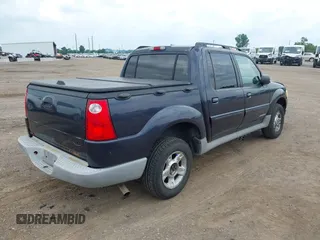 2002 Ford Explorer Sport Trac Value z VIN 1FMZU67E22UB82789, wystawiony jako IAAI lot #42860470 z przebiegiem 175 661 mil mil oraz . Historia ofert i sprzedaży dostępna na DreamBid. Obrazek 4.