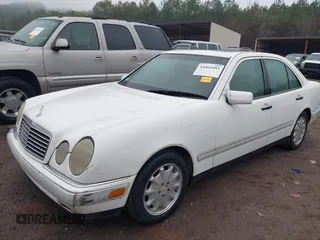 1997 Mercedes-Benz E-Class with VIN WDBJF55F4VA424262, listed as a IAAI auction lot 41462993 with 1 mi miles. Bid and sale history available at carsss.com. Image 2.