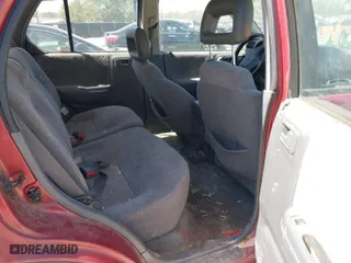 1999 Isuzu Rodeo S with VIN 4S2CM58W1X4356519, listed as a IAAI auction lot 41693480 with 225,839 mi miles. Bid and sale history available at carsss.com. Image 8.