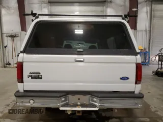 1997 Ford F-250 with VIN 1FTHX25F7VEC46738, listed as a Copart auction lot 59603125 with 211,004 mi miles and Salvage title. Bid and sale history available at DreamBid. Image 6.