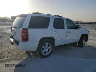 2013 Chevrolet Tahoe LTZ with VIN 1GNSCCE08DR102648, listed as a Copart auction lot 49677345 with 226,528 mi miles and Salvage title. Bid and sale history available at DreamBid. Image 3.