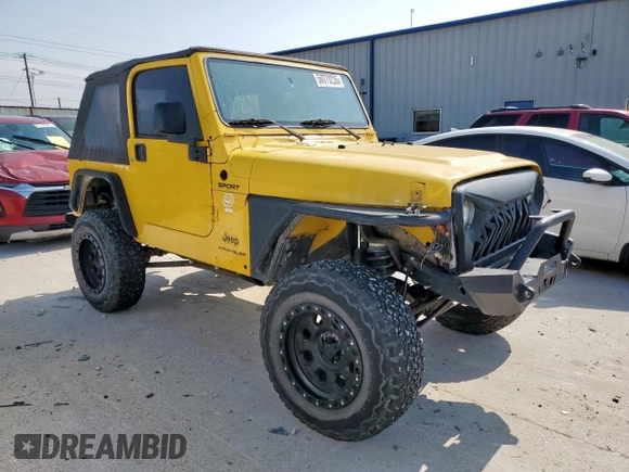 2003 Jeep Wrangler Sport with VIN 1J4FA49S43P369906, listed as a Copart auction lot 58079235 with 139,547 mi miles and Salvage title. Bid and sale history available at DreamBid. Image 4.
