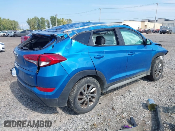 2017 Hyundai Tucson SE with VIN KM8J3CA40HU497758, listed as a IAAI auction lot 40387586 with 118,800 mi miles. Bid and sale history available at carsss.com. Image 4.