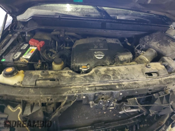 2015 Nissan Armada Platinum z VIN 5N1BA0NFXFN620977, wystawiony jako Copart lot #47793445 z przebiegiem 172 514 mil mil oraz Szkoda całkowita • Salvage title. Historia ofert i sprzedaży dostępna na DreamBid. Obrazek 13.