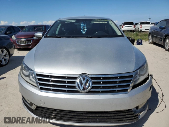 2013 Volkswagen CC R-Line z VIN WVWBN7AN1DE536851, wystawiony jako Copart lot #76972914 z przebiegiem 105 799 mil mil oraz Szkoda całkowita • Salvage title. Historia ofert i sprzedaży dostępna na DreamBid. Obrazek 5.