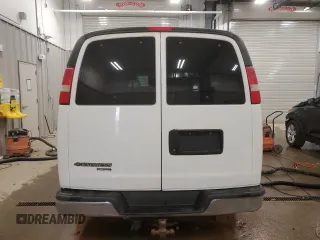 2014 Chevrolet Express Passenger LT with VIN 1GAZG1FG4E1176590, listed as a Copart auction lot 83660024 with 167,653 mi miles and Salvage title. Bid and sale history available at DreamBid. Image 6.