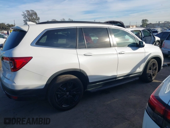 2022 Honda Pilot Special Edition with VIN 5FNYF5H20NB034677, listed as a IAAI auction lot 41372317 with 28,708 mi miles and . Bid and sale history available at carsss.com. Image 13.