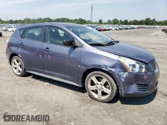 2009 Pontiac Vibe 1SB with VIN 5Y2SP67039Z431857, listed as a Copart auction lot 62357425 with 104,786 mi miles and Salvage title. Bid and sale history available at DreamBid. Image 4.