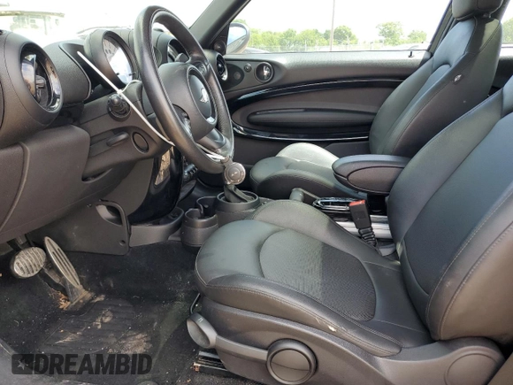 2013 MINI Paceman S ALL4 z VIN WMWSS7C56DWN71592, wystawiony jako Copart lot #57628475 z przebiegiem 83 488 mil mil oraz Szkoda całkowita • Salvage title. Historia ofert i sprzedaży dostępna na DreamBid. Obrazek 7.