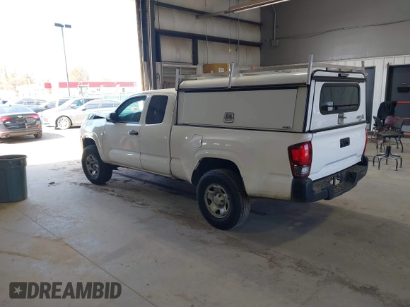 2020 Toyota Tacoma SR with VIN 5TFRX5GN1LX177797, listed as a IAAI auction lot 41882427 with 107,787 mi miles and . Bid and sale history available at DreamBid. Image 3.