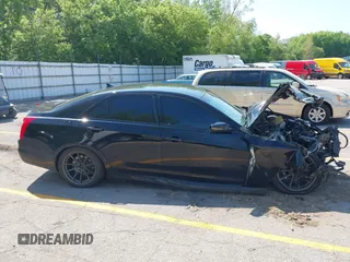 2014 Cadillac CTS Vsport RWD z VIN 1G6AU5S87E0176224, wystawiony jako IAAI lot #42273736 z przebiegiem Nie podano mil oraz . Historia ofert i sprzedaży dostępna na DreamBid. Obrazek 13.