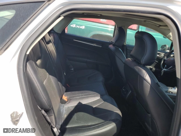 2019 Ford Fusion Hybrid Titanium with VIN 3FA6P0RU5KR277649, listed as a Copart auction lot 69391284 with 90,772 mi miles and Clean Title. Bid and sale history available at carsss.com. Image 10.