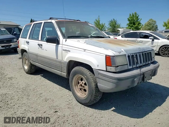 1993 Jeep Grand Cherokee Laredo с VIN 1J4GZ58S2PC654248, выставлен на аукционе Copart как лот 61259735 с пробегом 251 360 миль миль и Списание • Salvage title. История ставок и продаж доступна на DreamBid. Изображение 14.
