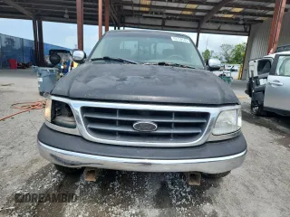 2001 Ford F-150 XL with VIN 1FTRX17L51NA83857, listed as a Copart auction lot 62759145 with 215,961 mi miles and Salvage title. Bid and sale history available at DreamBid. Image 5.