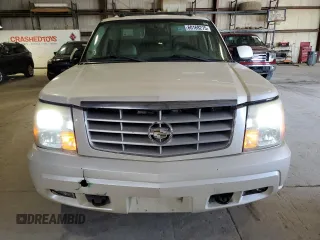 2005 Cadillac Escalade z VIN 1GYEK63N95R244477, wystawiony jako Copart lot #60168275 z przebiegiem 207 957 mil mil oraz Czysty tytuł • Clean title. Historia ofert i sprzedaży dostępna na DreamBid. Obrazek 5.