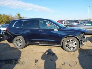 2021 Cadillac XT6 Premium Luxury with VIN 1GYKPFRS9MZ141298, listed as a IAAI auction lot 41304705 with 87,470 mi miles. Bid and sale history available at carsss.com. Image 13.
