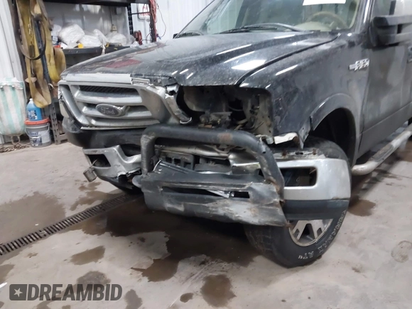 2004 Ford F-150 XLT with VIN 1FTPW14584KB43877, listed as a IAAI auction lot 41092424 with 237,990 mi miles. Bid and sale history available at carsss.com. Image 6.