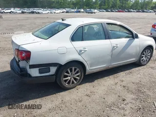 2010 Volkswagen Jetta Limited Edition with VIN 3VWRZ7AJ7AM058938, listed as a IAAI auction lot 42348838 with 102,482 mi miles and . Bid and sale history available at DreamBid. Image 4.
