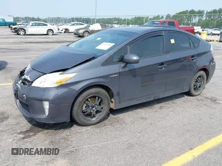 2015 Toyota Prius Four with VIN JTDKN3DU3F0458455, listed as a IAAI auction lot 42389286 with 215,703 mi miles and . Bid and sale history available at DreamBid. Image 2.