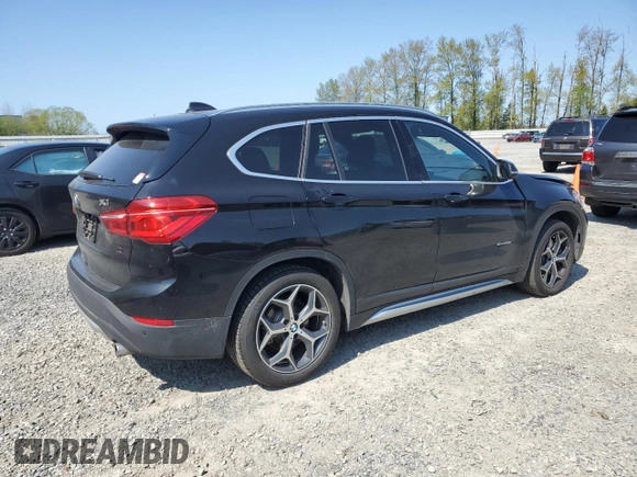 2017 BMW X1 xDrive28i with VIN WBXHT3C32H5F82141, listed as a Copart auction lot 53311785 with 52,867 mi miles and Salvage Title. Bid and sale history available at carsss.com. Image 3.